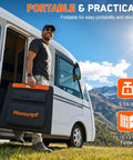 Man holding 200W Portable Solar Panel Foldable Charger With ETFE Laminate for camping and RV next to camper van