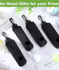 Four black golf ball holder and tee pouch belt clip set 4 pack compact ball carrier for golfers with keychain on white surface.