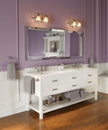 Bathroom with Wynford 24-Inch Single Towel Bar in Polished Nickel Finish next to double sink vanity, purple walls