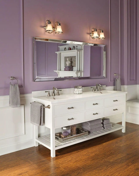 Bathroom with Wynford 24-Inch Single Towel Bar in Polished Nickel Finish next to double sink vanity, purple walls