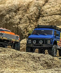 RockVan RC Crawler One Eighteenth Scale with Two Speed Transmission and All Metal Gears on rocky terrain