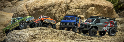 RockVan RC Crawler One Eighteenth Scale with Two Speed Transmission and All Metal Gears on rocky terrain