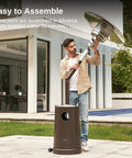 Man assembling Massive 50,000 BTU Patio Heater With Table Design, Sand Box, Dual Layer Stainless Steel Burner, Wheels