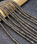 Fresh Hand Polished Natural Fluorite Stone Beads Cylinder Abacus Shape Loose Spacer Gems Dope DIY Bracelet And Necklace Jewelry Making Supplies Craft Kit 2X6MM, smooth gray beads on black background.