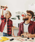 Child playing with model plane, parent assisting with 5 In 1 STEM Kit For Kids Ages 8 To 12 Build Five Model Cars Wooden 3D Puzzles.