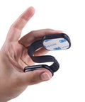 Hand holding a Six Pack Kid Safe Cabinet Lock with Tough 3M Adhesive, black adjustable strap for baby proofing.