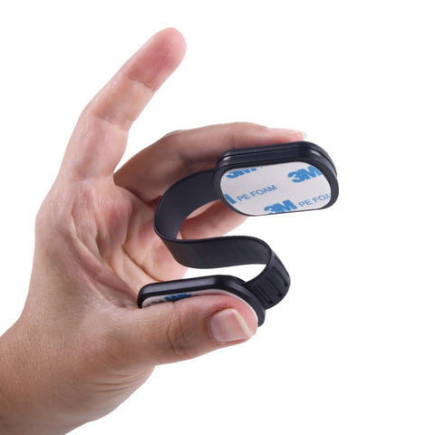 Hand holding a Six Pack Kid Safe Cabinet Lock with Tough 3M Adhesive, black adjustable strap for baby proofing.