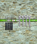 Heavy Duty Magnetic Tool Holder Kit 8 Pack 18 Inch Tool Bars With Mounting Brackets And S Hooks Wall Mount Strip Rack Carbon Steel Built Tough Pro Grade Hold 50 Lb Per Bar Holds Wrenches Screwdrivers Spanners Green holding tools on stone wall
