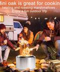 People sitting around a fire in a portable stove with mini oak wood, roasting marshmallows, camping scene with RV in background.