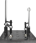 Badass Folding Welding Table 21 By 44 Inch 12 Gauge Steel Workbench clamps and slots on a steel surface for project stability.