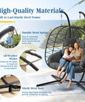 Two Person Foldable Hanging Egg Chair With Stand For Indoor Outdoor Use Wicker Porch Swing Chair Heavy Duty Rattan Hammock Loveseat With Cushions For Bedroom Garden Balcony Patio 650 Lbs Cozy Vibes, shown with two people seated on a patio.