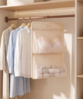 Mesh Hanging Closet Organizer And Polyester Bra Underwear Storage Hanger Ultra Slim Vertical Lingerie Bag with bras and rolled towels.