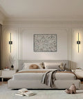 No Sweat Wireless Setup Matte Black And Brushed Gold Battery Wall Sconces Set Of Two With 360 Degree Rotate Tube in modern bedroom.