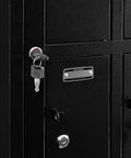 Eight Door Smartphone Charging Locker Featuring Sturdy Steel Build And Handy Power Outlets Keep Your Tablets Phones And Wallets Locked Up Safe And Sound With Reliable Keyed Entry Plus Quick Master Override Access, close-up of key in lock.