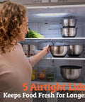Woman placing Stainless Steel Mixing Bowls with Lids Set featuring airtight lids and non-slip base into fridge, five nesting bowls shown.