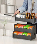 Go-To Tea Bag Organizer Rack With 3-Tier Bamboo Display, Stackable Wall Mount, Holds 180 Plus Tea Bags, Black Finish on counter