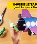 Hand crafting airplane model using Invisible Magic Tape 4-Pack Refill Rolls 0.75 in x 1000 in, shows matte finish office supply.