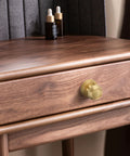 Brushed Gold Solid Brass Cabinet Knobs 5 Pack 1.18 Inch Diameter installed on wooden drawer