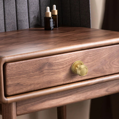 Brushed Gold Solid Brass Cabinet Knobs 5 Pack 1.18 Inch Diameter installed on wooden drawer