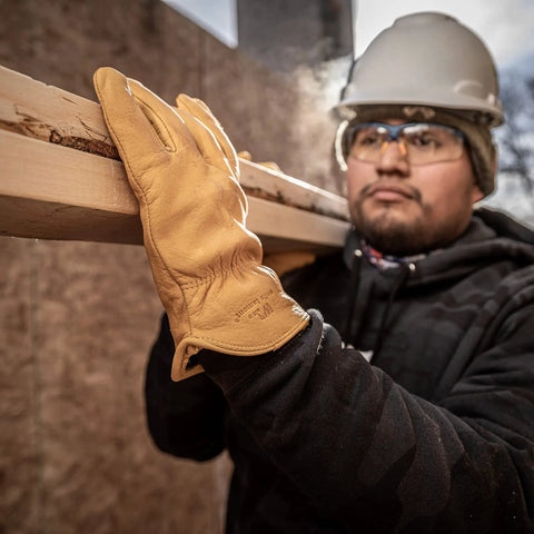 Worker wearing Insulated Leather Work Gloves For Men With 100G 3M Thinsulate And Fleece Lining Full Grain Cowhide Ergonomic Fit