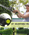 Woman using Cordless Hedge Trimmer 20V With Dual Batteries And Charger For Lawn And Garden Care on hedges, showing adjustable head for angles