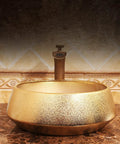 Premium Gold Ceramic Round Vessel Sink For Bathroom Countertop Vanity With A Slick Scratch Resistant Glaze And Easy Maintenance Design For Daily Home Use on marble countertop.