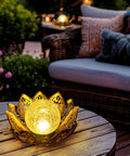 Gold Petal Lotus Flower Solar Light With Crackle Glass Globe Lit Amber Glow Outdoor Yard Lanterns For Pathway Patio Pond Waterproof Decor Perfect Gift For Mom Grandma on a wooden table