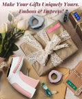 Vintage Embossing Label Maker With Six Adhesive Tape Rolls Manual Typewriter Style Sticker Gun on wrapped gifts with ribbon.