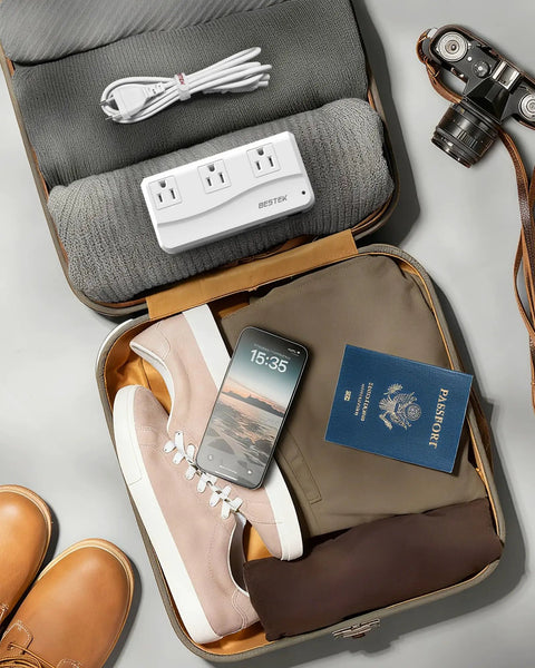 Travel Voltage Converter 220V To 110V With 4 USB Ports, 250W Power Adapter in open suitcase with shoes and passport