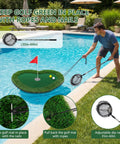 Man using ropes to stabilize a Floating Golf Green 35x28 For Pool And Lake with included balls, mat visible in a backyard pool.