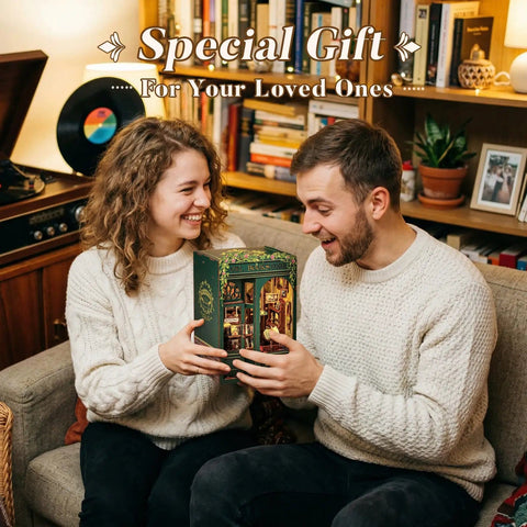 Couple smiling and holding Owl Bookstore Book Nook Kit For Beginners And Teens, DIY Miniature House For Dollhouse Lovers