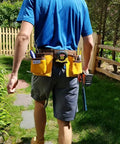 Man wearing 11 Pocket Suede Leather Heavy Duty Tool Belt Built Tough For Pros With Hammer Loops Measuring Tape Clip 4 Large Pouches