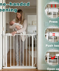 Woman holding baby using a one-handed opening Walk Through Baby Gate With Door, Adjustable 29.5 To 52.5 Inch Wide, pressure mounted.