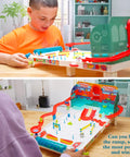 Kids playing with Build Your Own Pinball Machine STEM Kit For Kids And Makers, Gumball Rally Edition on a table