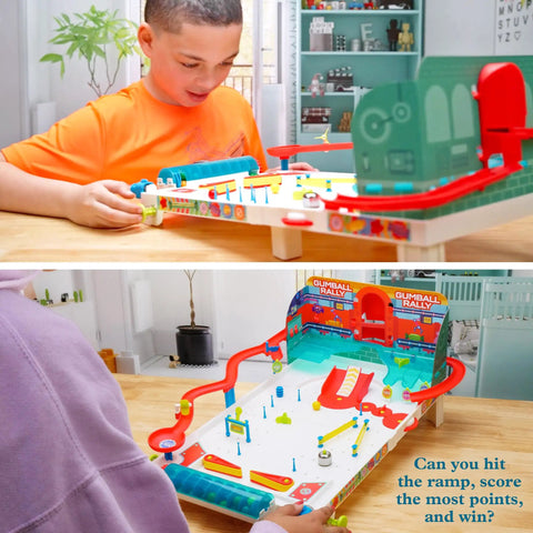 Kids playing with Build Your Own Pinball Machine STEM Kit For Kids And Makers, Gumball Rally Edition on a table