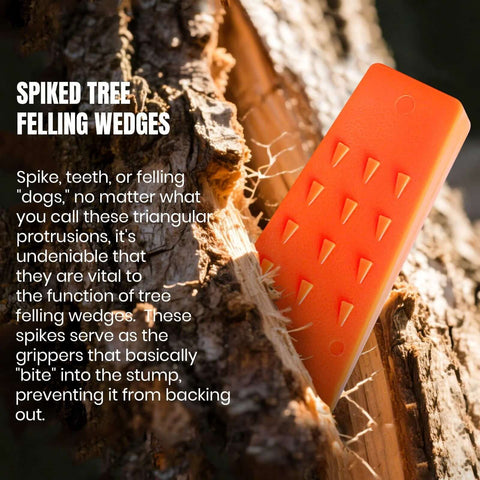 Side view of orange plastic tree felling wedge with spikes embedded in a log.