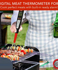 Digital Meat Thermometer Fork For Grilling And BBQ With Fast Read Probes in use on steak and kebabs on a grill