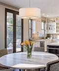 Three Light Drum Pendant Chandelier With White Fabric Shade Brushed Nickel Finish Tempered Glass Diffuser in kitchen