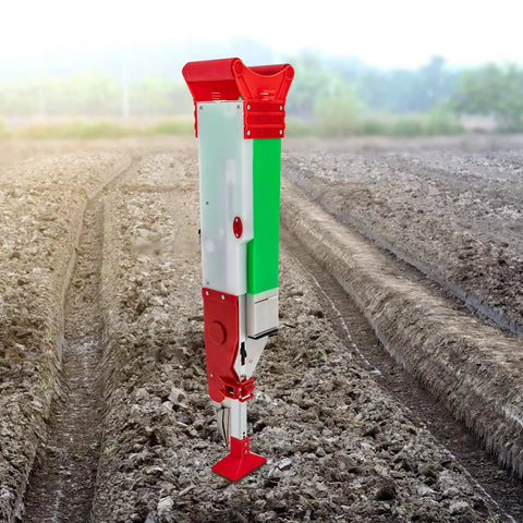 Handheld Garden Seeder And Planter Tool For Quick, Precise Sowing Of Corn, Beans, Peas And Veggies in a plowed field