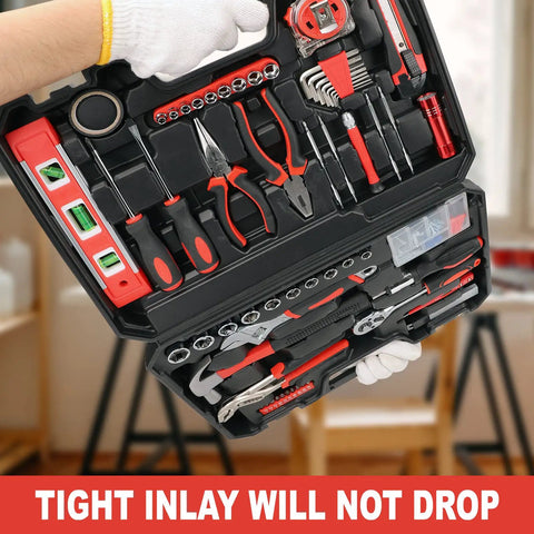 Hands holding All In One 38 Piece Home Tool Kit With Portable Box, displaying chrome-plated tools and accessories for DIY projects