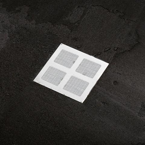 Nukinp Disposable Hair Drain Stickers, 60 Pack 4x4 Fiberglass Disposable Drain Covers on a dark surface.