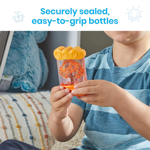 Child holding autumn Seasonal Sensory Tube for Calming Kids, Chill Out Fidgets for Travel and School, hands-on stress relief toy