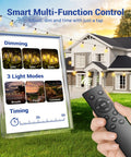 100 Ft LED Outdoor String Lights With Remote Control, dimming modes and timing options visible, house backdrop, hand holding remote