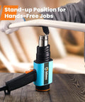 1800W Heavy Duty Heat Gun with Stepless Temperature Control, shown in stand-up position for hands-free use on a metal rod.