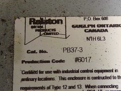 Label on Used PB37-3 Industrial Control Panel Enclosure showing catalog and production codes.