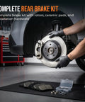 Mechanic installing rear brake kit with carbon ceramic rotors for 2010 to 2018 Hyundai Santa Fe Sport Santa Fe XL and 2011 to 2020 Kia Sorento
