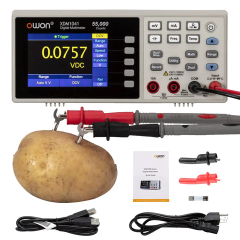 Ultra Slim Digital Multimeter With AC And DC Voltage And Current Measurement Up To 1000V And 10A testing a potato with accessories