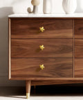 Real Deal Solid Brass Cabinet Knobs Slick Flower Backplate Brushed Gold Finish on wooden dresser drawers