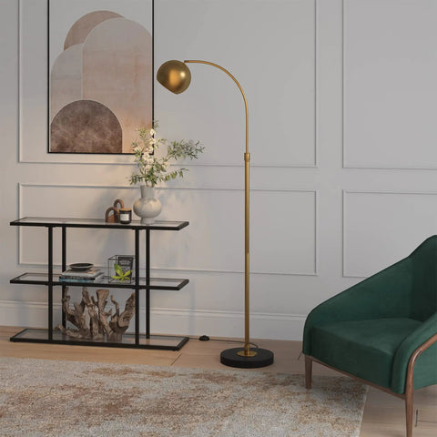 Arc Floor Lamp In Brass And Blackened Bronze For Living Room Bedroom Office And Dining Areas With Adjustable Head Two Tone Modern Pharmacy Style Eye Catching Minimalist Lighting Upgrade standing beside console table in a modern living room.