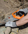 Person using a handsaw wearing Level 5 Cut Resistant Warehouse Work Gloves Crinkle Latex Coated Palm And Fingers EN 388 Large